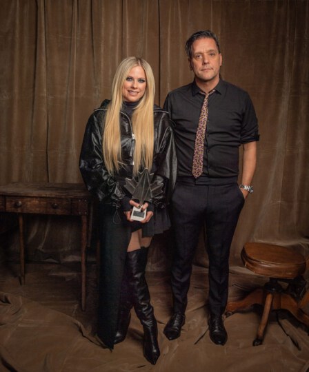 Avril Lavigne and George Stroumboulopoulos posing for portrait at Canada's Walk of Fame 25th Anniversary