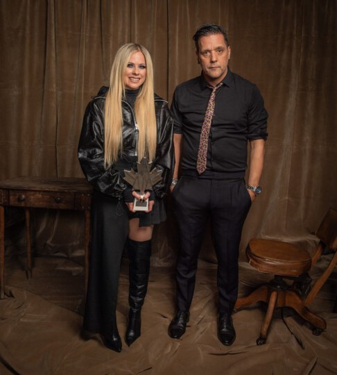 Avril Lavigne and George Stroumboulopoulos posing for portrait at Canada's Walk of Fame 25th Anniversary