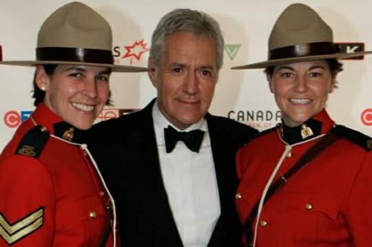 Alex Trebek with mountie at the 2006 Red Carpet event