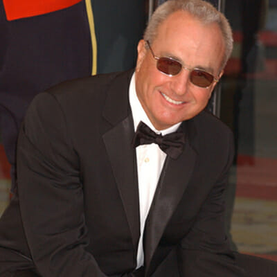 Lorne Michaels with sunglasses and tuxedo